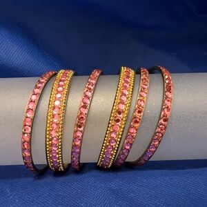 SIX PINK BANGLE BRACELETS